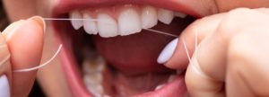 gums are bleeding when flossing